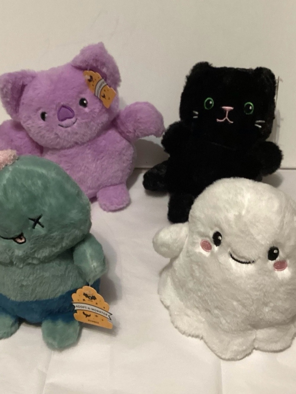 Four Bullseye Playground “Adopt-A-Monster Plushies